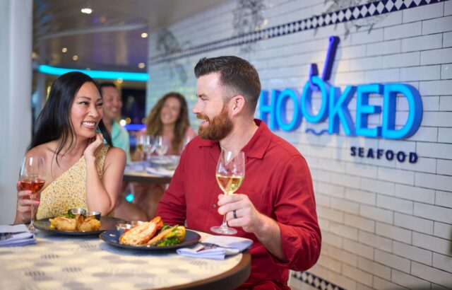 Indulge in a seafood lover's paradise at Hooked Seafood, only on Royal Caribbean! 🦪 ✨Savor the flavors of New England, from crispy Maryland crab cakes to delicious Maine lobster rolls. 🦀 Treat yourself to the taste of summer, any time of the year! #RoyalCaribbean #FoodieAdventure