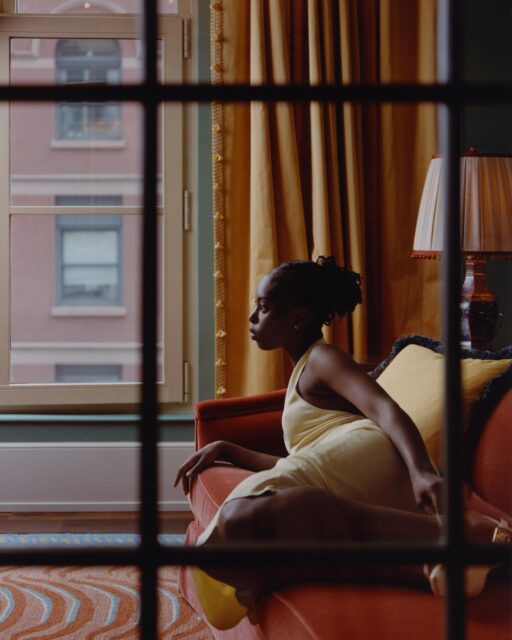 A modern flâneuse sits within walls first imagined in the Gilded Age, where the spirit of the mansion reveals itself through texture and time.